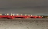 С 9 февраля Троицкий мост украсит яркая красная подсветка