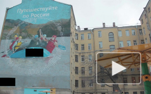 Петербуржцев возмутило граффити с рекламой сотового оператора на историческом здании