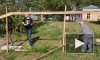 Активисты из Петроградского района демонтировали незаконно построенный забор в Лопухинском саду