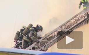 Пожарные эвакуировали из горящего дома 15 человек, в том числе двух детей в возрасте 8 и 15 лет