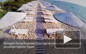 Ликующие турки с цветами встретили в аэропорту первый чартер из России