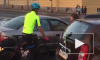 Видео: автовладелец затеял скандал на дороге с велосипедистом 