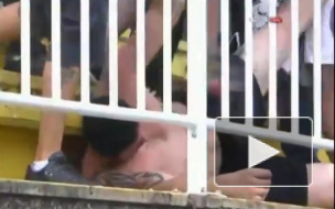 Два болельщика погибли в массовой драке на трибунах