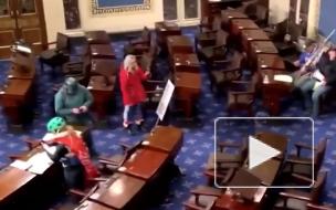 Протестующие в Вашингтоне ворвались в зал заседаний Сената