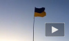 В Крыму украинцы подняли государственный флаг в память о погибших в Донбассе 