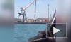 Видео из Приморья: на заводе от ветра рухнул портовый кран 