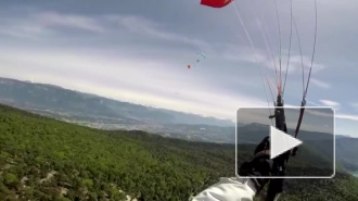 Парапланерист снял на видео свое падение с полуторакилометровой высоты после столкновения