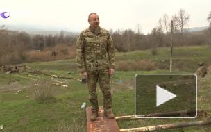 Алиев потоптал ногами армянский указатель в Карабахе