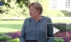 Меркель назвала кризис с беженцами на границе с Белоруссией "гибридной атакой"