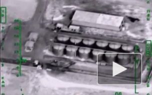 Минобороны РФ опубликовало эффектное видео разгрома нефтехранилища ИГИЛ российской авиацией