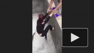 Видео: девушка борется с бешеной крысой в яме 