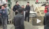 Убийство китайского полицейского мотыгой попало на видео