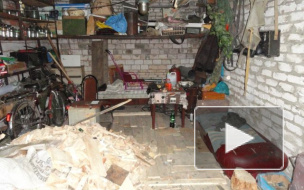 Бутылка водки и шприц на два трупа были обнаружены в гараже
