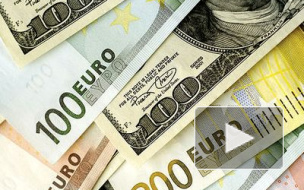 Курсы евро и доллара на Московской валютной бирже немного выросли 