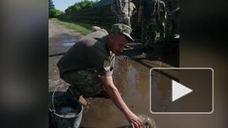 Военным приказали осушить лужи перед визитом Зеленского